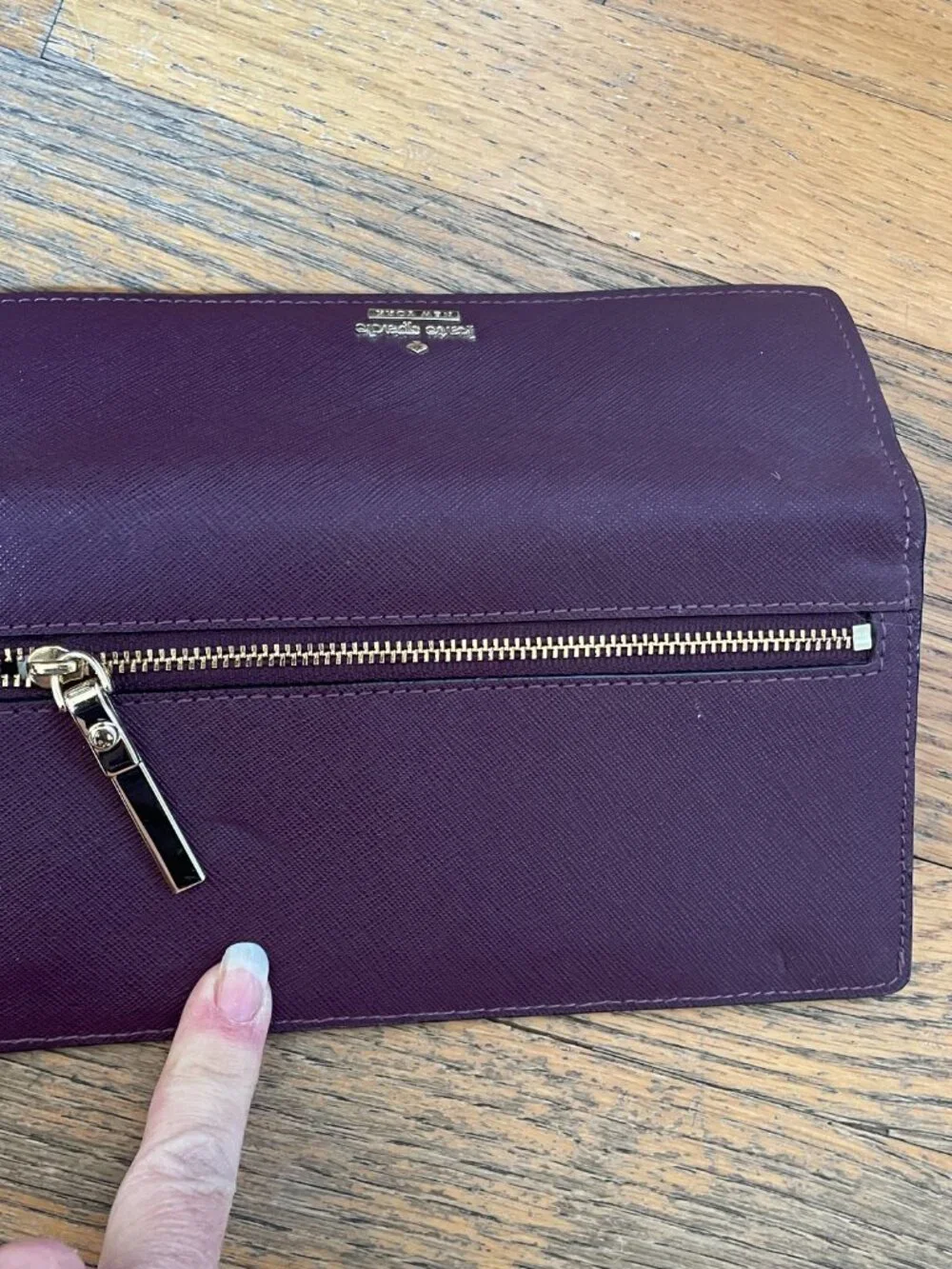Kate Spade Large bi- Fold wallet in Deep Plum